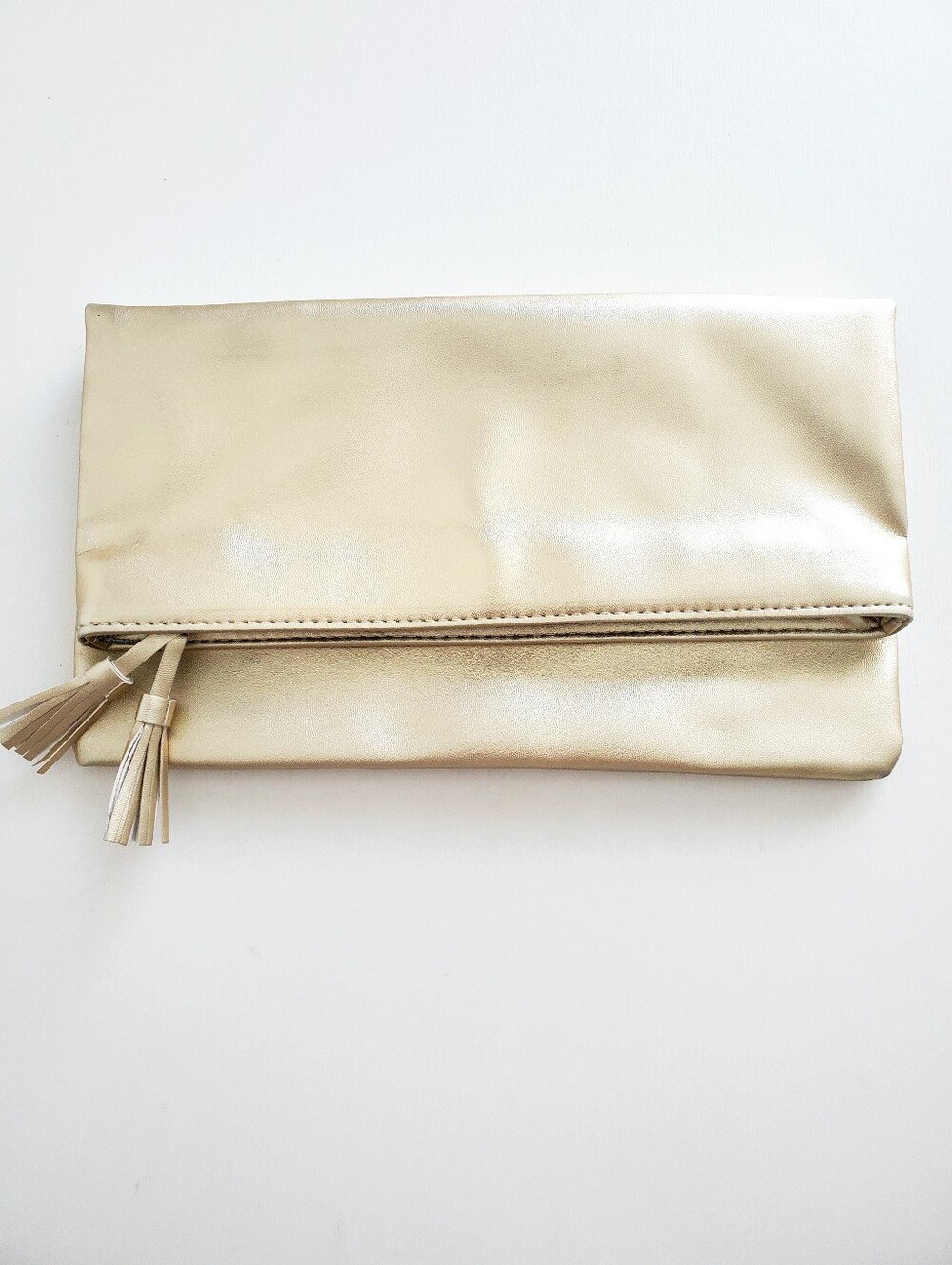 Monat Gold Clutch with Tassels